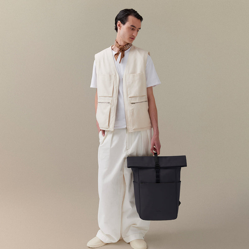 Yuto Roll-Top Backpack in action